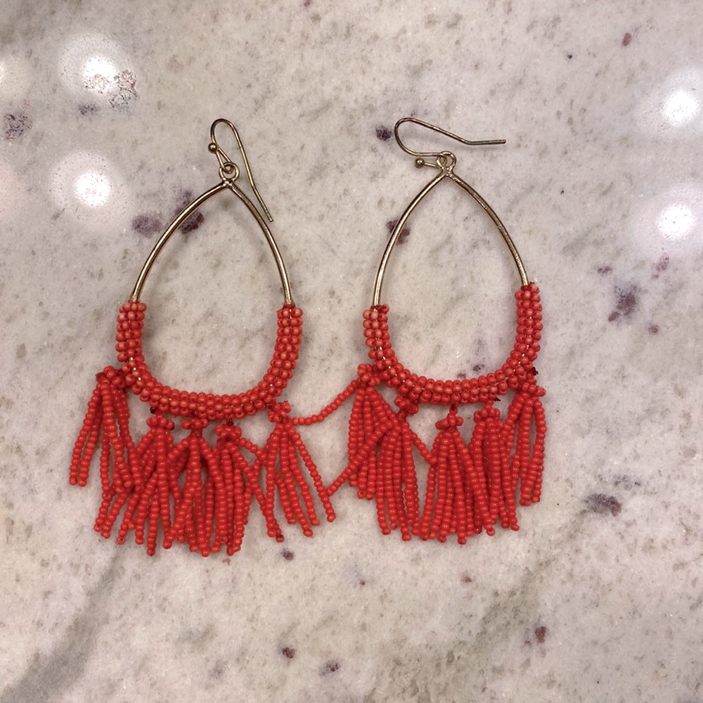 Target gold colored earrings with orange beads